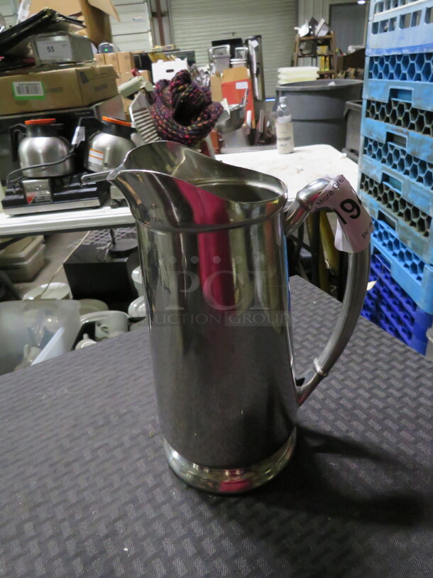 One Stainless Steel Beverage Pitcher.