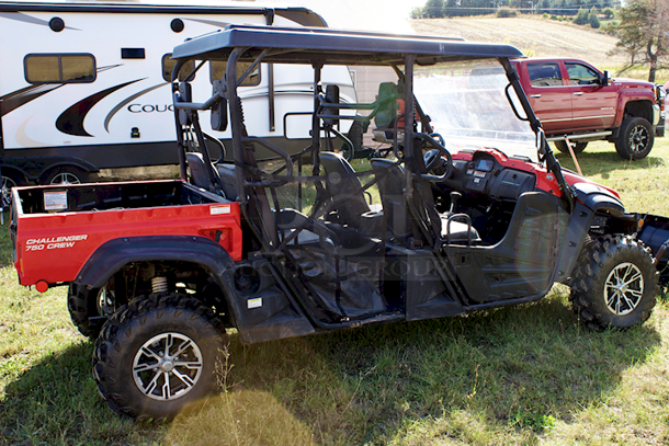 Club Cadet Model#: 37AY8CMD710 Challenger 750 Crew UTV With Attached Plow!! TESTED! RUNS GREAT!! 4x4 - 1200lbs Tow Capacity - 735cc Engine - Hard-Top Roof - Quick-Release Windshield - Front-Mount Winch - Digital Dash Display - Bumper Guard - Large Profile 26" Off-Road Tires - Dump Bed
 - Image 10 of 12