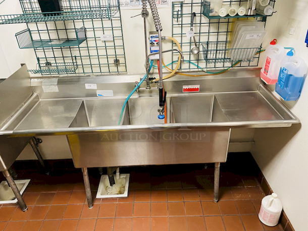BEAUTIFUL!! Duke Manufacturing SDTS-2116-32-18C 83" Stainless Steel Three Compartment Sink.                  .Condition: 9/10                      . Unit comes With Double Drainboards and Pre-Rinse Unit with Add a Faucet.                          . Sink bowls are 16x21x14 Inches Deep and Drainboards 18 inches wide.                                . 83x27x44 - Image 1 of 6