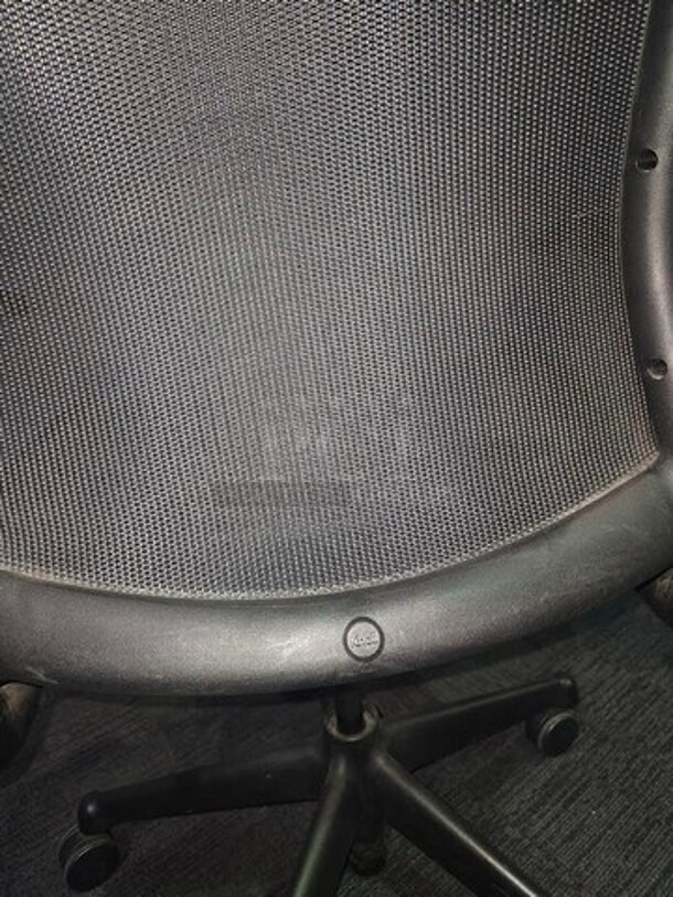 Black office/ desk chair made by Knoll. Features breathable fabric, armrests and has a black metal frame on wheels. In good used condition with signs of use and some scratches but a great chair from a well-known brand. Measures 40” H x 26.5” W. 

 - Image 3 of 3