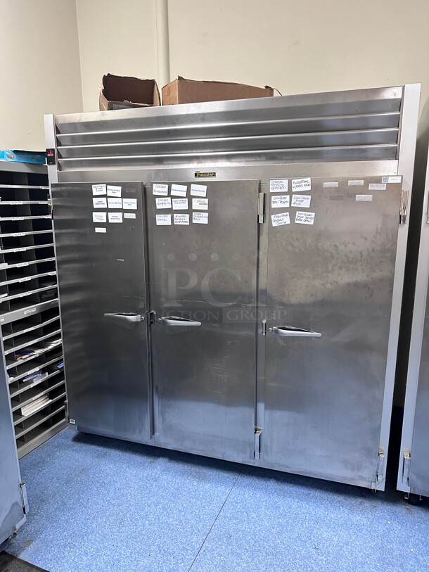 Late Model! Traulsen G31010 77 inch G Series Solid Door Reach-In Freezer with Left / Right / Right Hinged Doors 115 Volt Tested and Working!