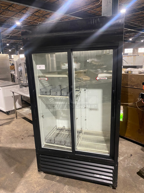 True Commercial 2 Door Reach In Refrigerator Merchandiser! With View Through Sliding Doors! With Poly Coated Racks! Model: GDM37 SN: 2254291 115V 60HZ 1 Phase
