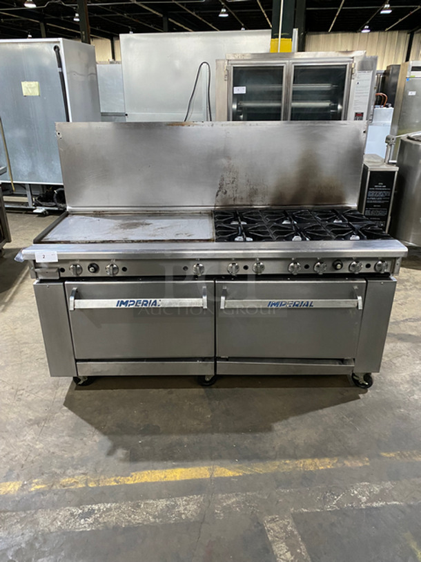 Sweet! Imperial Commercial Natural Gas Powered 6 Burner Stove With Left Side Flat Top Griddle! 2 Full Size Ovens Underneath! With Metal Oven Racks! Left Side Splash And Raised Back Splash!  All Stainless Steel! On Casters!