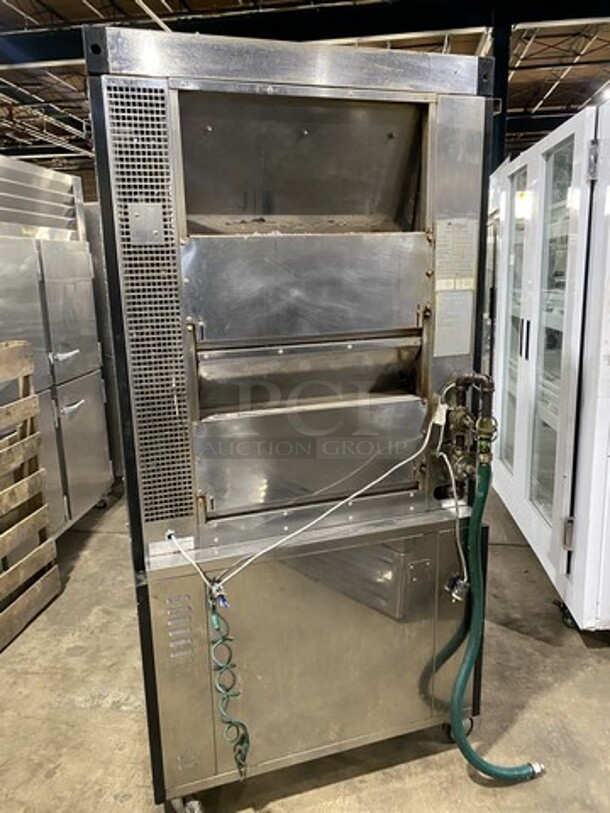 Nice! ROTISOL Heavy Duty Natural Gas Fired Chicken Rotisserie Machine! With Skewers! Model 975.5 Serial 7949! 220-240V/60Hz/1 Phase! On Commercial Casters! 
 - Image 4 of 10