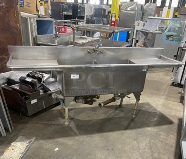 Commercial 2 Compartment Dish Washing Sink! With Dual Side Drain Board! With Back Splash! All Stainless Steel! On Legs! - Image 1 of 10