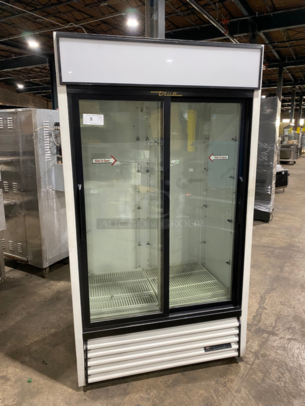True Commercial 2 Door Reach In Refrigerator Merchandiser! With View Through Sliding Doors! With Poly Coated Racks! Model: GDM37 SN: 5253908 115V 60HZ 1 Phase