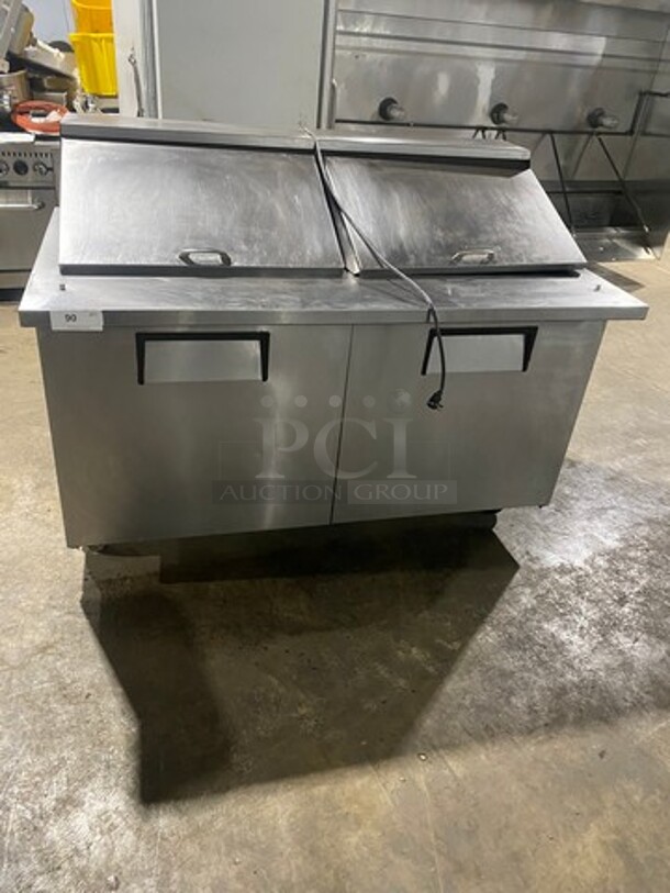 True Commercial Refrigerated Sandwich Prep Table! With 2 Door Underneath Storage Space! With Poly Coated Racks! All Stainless Steel! On Casters! Model: TSSU6024MBST SN: 7771911 115V 60HZ 1 Phase