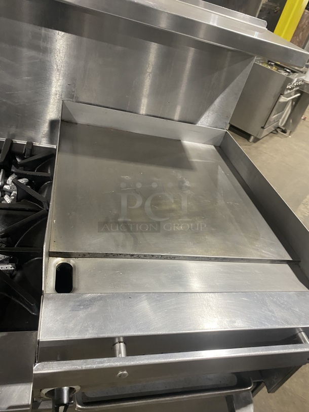 BEAUTIFUL! GARLAND All Stainless Steel Natural Gas Powered 6 Burner Range W/ Raised Right Side Flat Top W/ Cheese Melter! With 2 Ovens W/ Metal Racks! With Raised Over Back Splash & Slamander Shelf! On Commercial Casters! Working When Removed! - Image 6 of 9