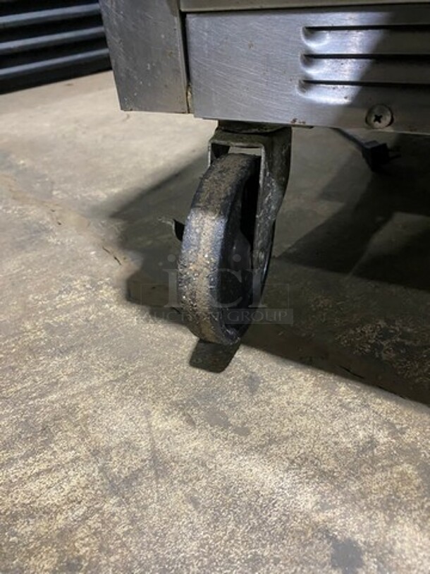 Nice! Beverage Air Commercial Refrigerated Sandwich Prep Table! With Commercial Cutting Board! With 2 Door Underneath Storage Space! With Poly Coated Racks! All Stainless Steel! On Casters! Model: SPE4812 115V 60HZ 1 Phase! Working When Removed! - Image 7 of 9