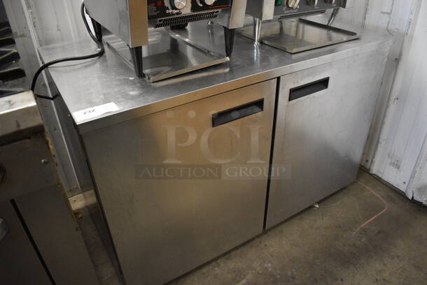 Delfield UC4048-STAR Stainless Steel Commercial 2 Door Undercounter Cooler. 115 Volts, 1 Phase. 48x29x32. Tested and Powers On But Does Not Get Cold
