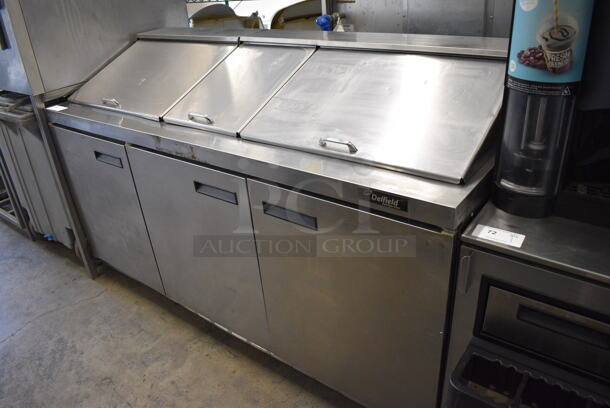 2010 Delfield 4472N-30M Stainless Steel Commercial Sandwich Salad Prep Table on Commercial Casters. 115 Volts, 1 Phase. 72x30x45.5. Tested and Powers On But Does Not Get Cold