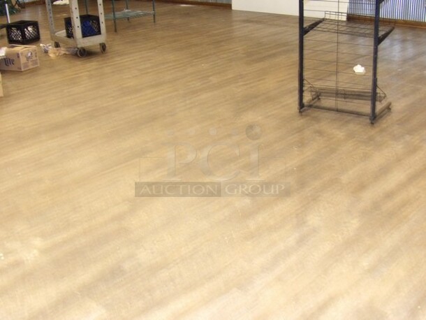 Snap/Lock Vinyl Flooring 
BUYER REMOVAL REQUIRED, CALL FOR MORE INFORMATION - Image 2 of 4