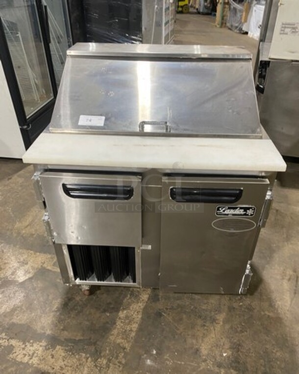 LATE MODEL! 2017 Leader Commercial Refrigerated Sandwich Prep Table! With 2 Door Underneath Storage Space! With Commercial Cutting Board! All Stainless Steel! On Casters! Model: LM36 SN: GA03M0902A 115V 60HZ 1 Phase