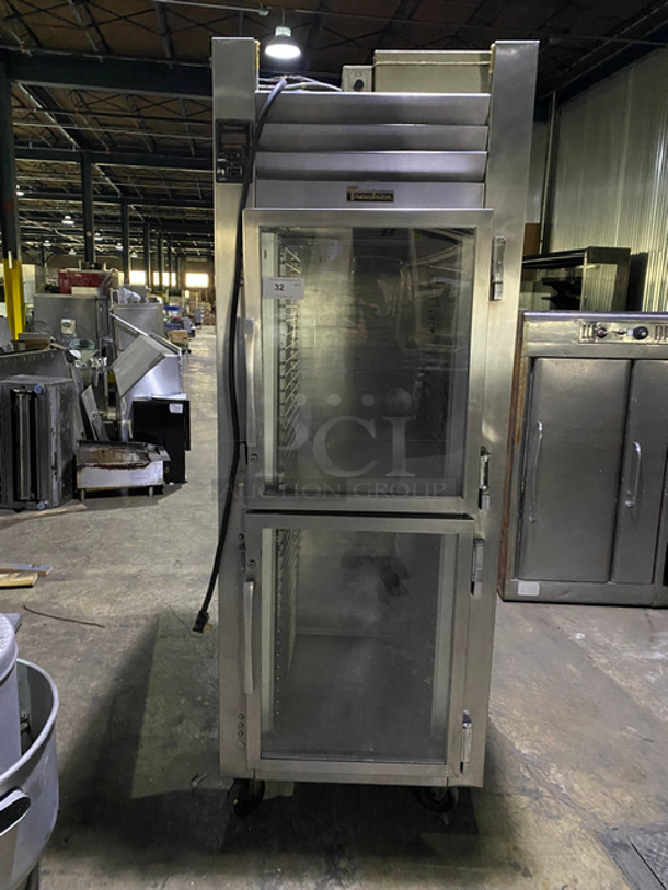 Traulsen Commercial Split Door Reach In Refrigerator! With View Through Doors! With Built In Full Size Tray Rack! All Stainless Steel! On Casters! Model: RHT132WUT SN: V697840J94 115V 60HZ 1 Phase