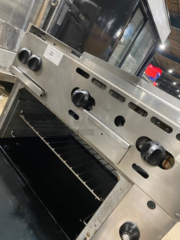 WOW! Vulcan Commercial Natural Gas Powered 2 Burner Stove With Flat Griddle! Flat Griddle Has Back And Side Splashes! With Oven Underneath! All Stainless Steel! On Casters! Model: 36S2B24GN SN: 481883161 - Image 8 of 10