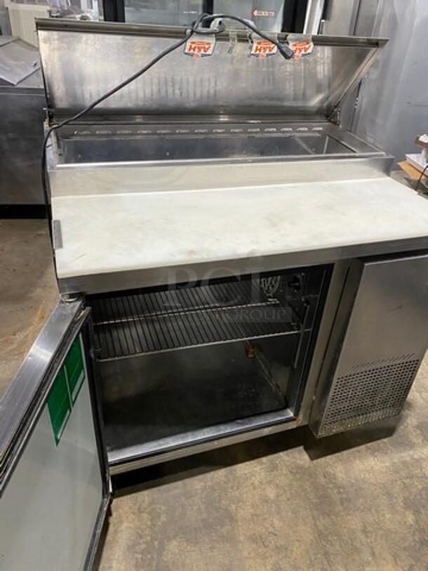 Nice! Turbo Air Commercial Refrigerated Pizza Prep Table! With Commercial Cutting Board! With Single Door Storage Space! Poly Coated Rack! All Stainless Steel! On Casters! Model: TPR44SD SN: TP4RA0100B 115V 60HZ 1 Phase! Working When Removed!  - Image 5 of 10