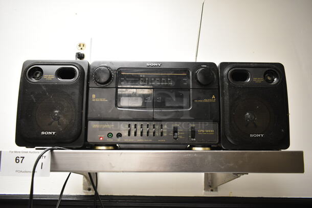 Stainless Steel Wall Mount Shelf w/ Sony CFS-W430 Radio Cassette Corder. BUYER MUST REMOVE. (kitchen)