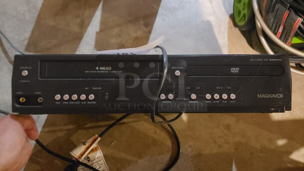 Magnavox DVD/ VCR Player (Location 1) - Image 1 of 1