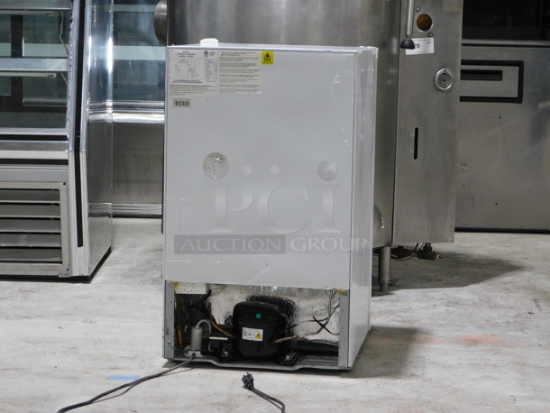 2.8 cu. ft. Upright Freezer with 3 Fixed Metal Shelves, Full Range Temperature Control, Reversible Door, Integrated Handle and ADA Compliant ..... Tested and Working
 - Image 4 of 6