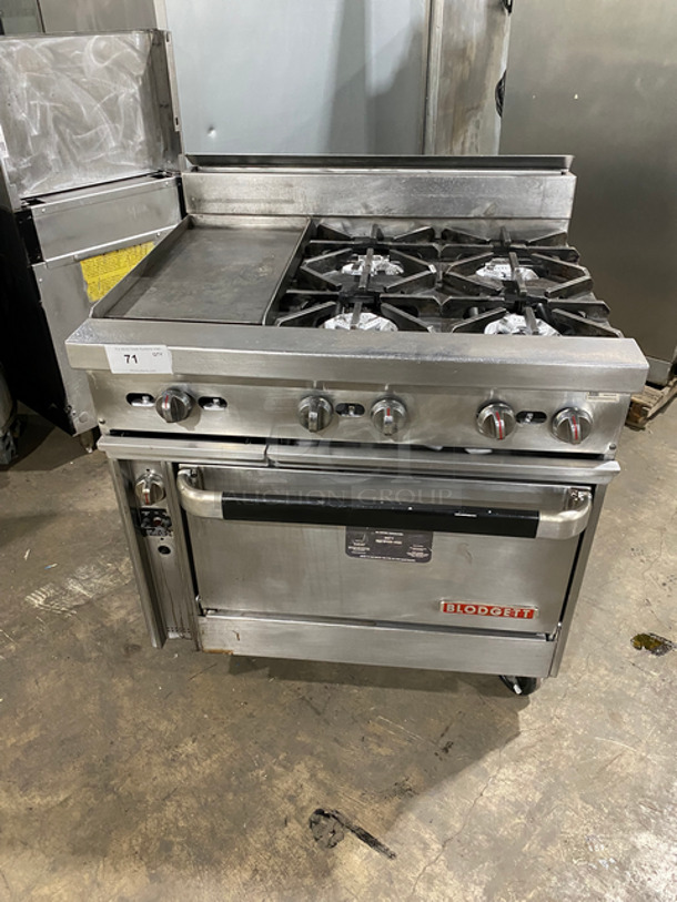 Blodgett Commercial Natural Gas Powered 4 Burner Range With Left Side Flat Griddle! Griddle Has Side Splashes! With Back Splash! With Oven Underneath! All Stainless Steel! On Casters!