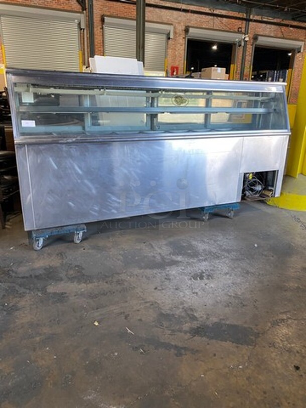 Commercial Refrigerated Deli Display Case Merchandiser! With Slanted Front Glass! With 4 View Through Sliding Rear Access Doors! With 5 Door Storage Space Underneath! All Stainless Steel!