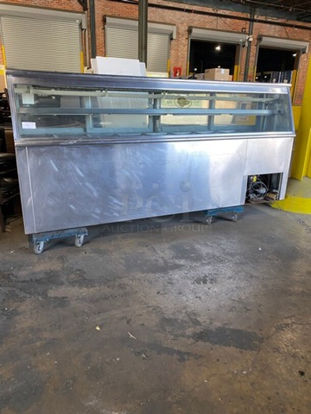 Commercial Refrigerated Deli Display Case Merchandiser! With Slanted Front Glass! With 4 View Through Sliding Rear Access Doors! With 5 Door Storage Space Underneath! All Stainless Steel! - Image 1 of 6