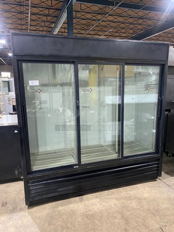 True Commercial 3 Door Reach In Cooler Merchandiser! With View Through Doors! Poly Coated Racks! Model: GDM69 SN: 4009937 115V 60HZ 1 Phase