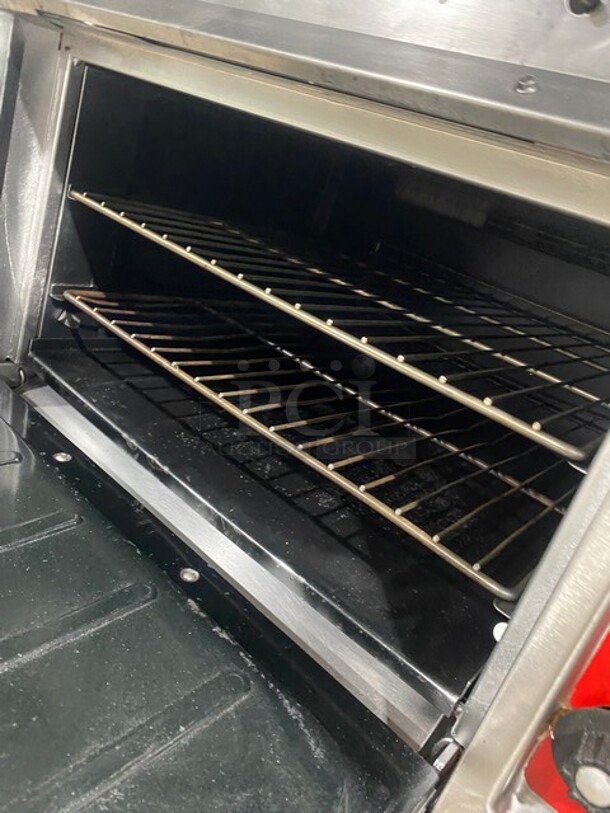 Vulcan Commercial Natural Gas Powered 4 Burner Stove! With Raised Back Splash Double shelf! With Oven Underneath! All Stainless Steel! On Casters! Model: GH45 SN: 4813044120 - Image 7 of 11