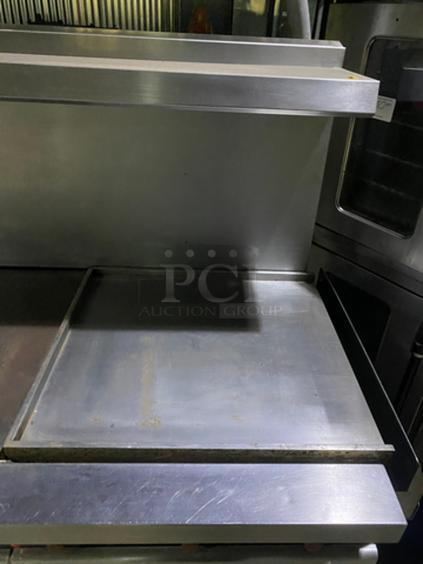 AN AMAZING FIND! Vulcan Commercial Natural Gas Powered 36 Inch French Top/24 Inch Flat Griddle Combo! With Backsplash & Overhead Salamander Shelf! With 2 Full Size Ovens Underneath! With Metal Oven Racks! All Stainless Steel! On Casters! Model: E60FL227 SN: 481550759 208/240V 1 Phase - Image 5 of 11