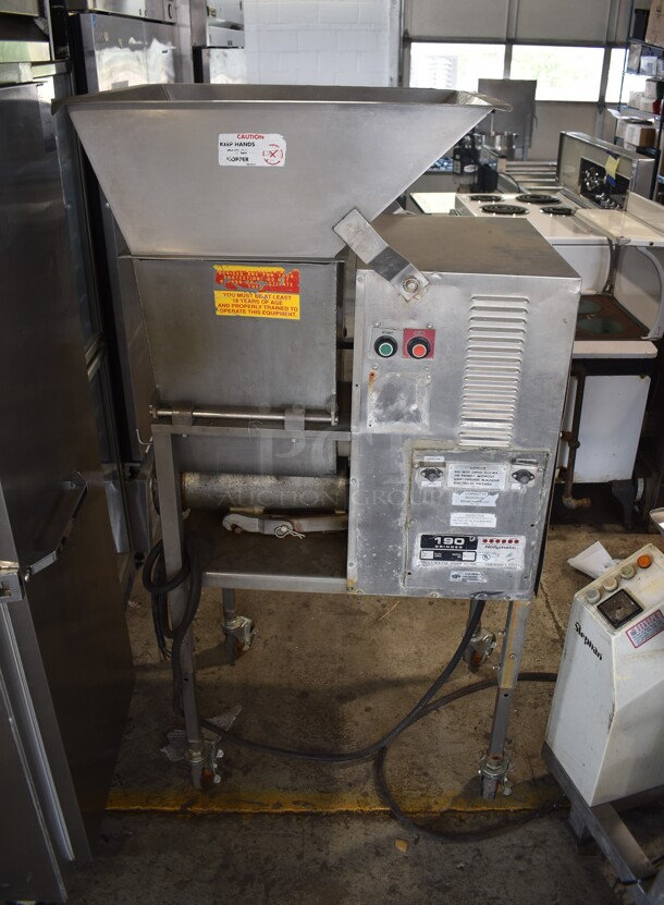 Hollymatic 190 Stainless Steel Commercial Floor Style Meat Grinder on Commercial Casters. 230 Volts.  - Image 1 of 11