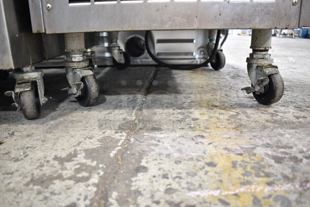 2016 Electro Freeze SLX500-232 Stainless Steel Commercial Floor Style 2 Flavor w/ Twist Soft Serve Ice Cream Machine on Commercial Casters. 208-230 Volts, 3 Phase.  - Image 3 of 11
