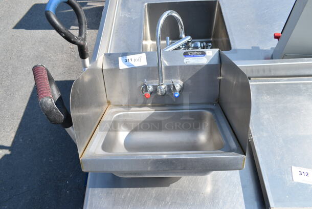 Stainless Steel Single Bay Wall Mount Sink w/ Faucet, Handles and Side Splash Guards.  - Image 1 of 6