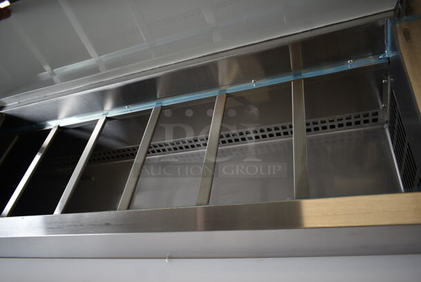 BRAND NEW SCRATCH AND DENT! 2023 Avantco 178SSPPT3 Stainless Steel Commercial Refrigerated Pizza Prep Table on Commercial Casters. 115 Volts, 1 Phase. Tested and Working! - Image 6 of 12