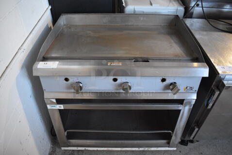 CPG G36T Stainless Steel Commercial Countertop Natural Gas Powered Flat Top Griddle on Regency Stainless Steel Stand. 90,000 BTU. 36x30x33.5