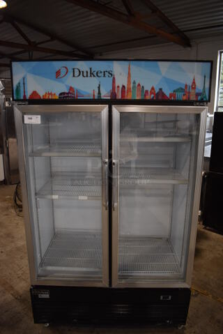 Dukers DSM-41R Metal Commercial 2 Door Reach In Cooler Merchandiser w/ Poly Coated Racks on Commercial Casters. 115 Volts, 1 Phase. Tested and Working!