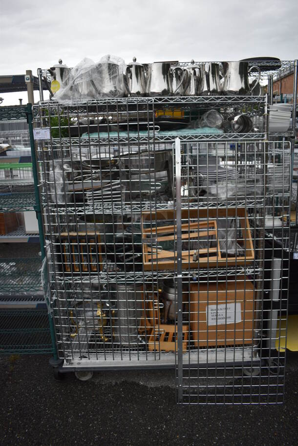 ALL ONE MONEY! Lot of Chrome Finish 5 Tier Shelving Unit on Commercial Casters w/ Liquor Cage and All Contents Including Metal Pitchers, White Ceramic Plates. BUYER MUST DISMANTLE. PCI CANNOT DISMANTLE FOR SHIPPING. PLEASE CONSIDER FREIGHT CHARGES. 49x25x68