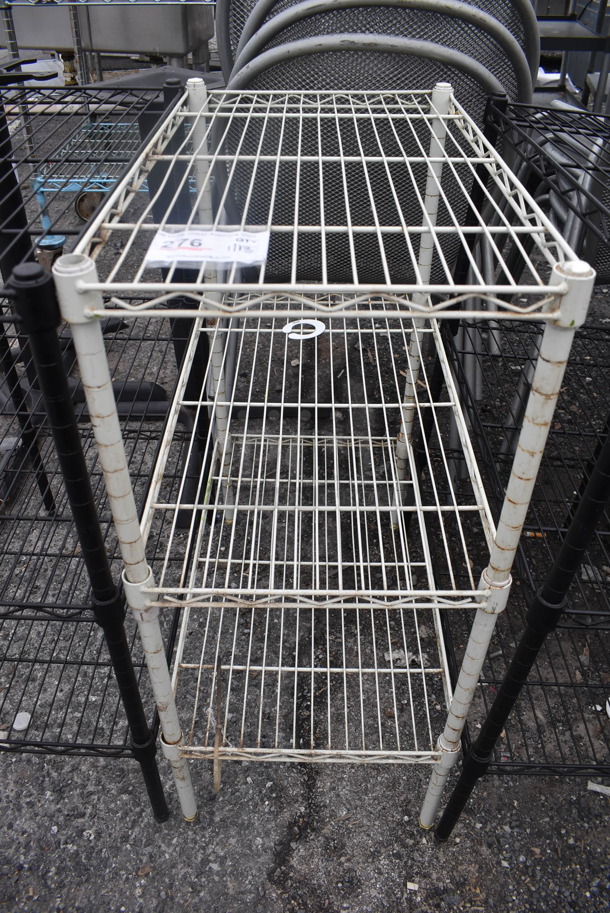 White Finish 3 Tier Wire Shelving Unit. BUYER MUST DISMANTLE. PCI CANNOT DISMANTLE FOR SHIPPING. PLEASE CONSIDER FREIGHT CHARGES. 23.5x13.5x31