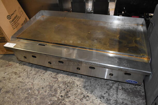 Cook Rite Stainless Steel Commercial Countertop Natural Gas Powered Flat Top Griddle.  - Image 1 of 6