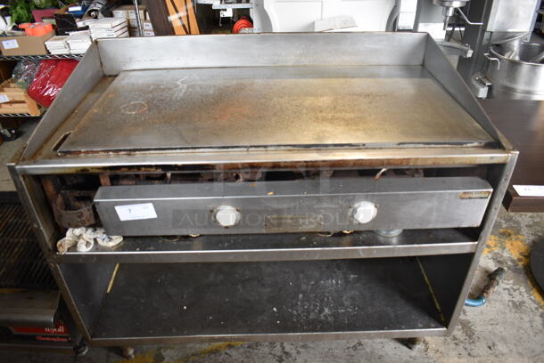 Keating Stainless Steel Commercial Chrome Top Natural Gas Powered Flat Top Griddle on Stainless Steel Equipment Stand. 51x32x41