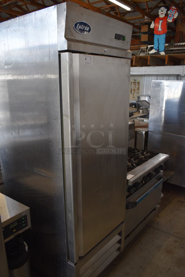 Entree Model CF1 Stainless Steel Commercial Single Door Reach In Freezer w/ Poly Coated Racks. 115 Volts, 1 Phase. 26.5x33x84. Tested and Powers On But Does Not Get Cold