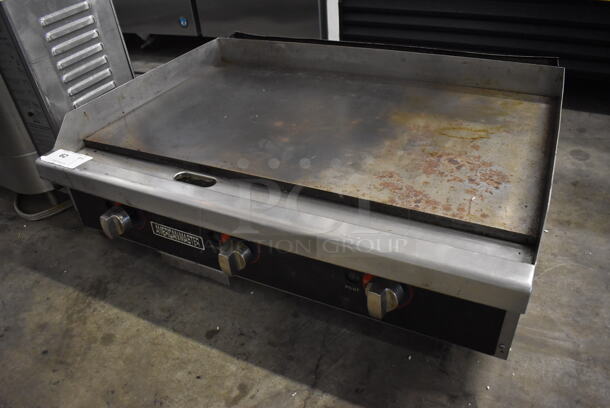 American Master Stainless Steel Commercial Countertop Natural Gas Powered Flat Top Griddle. 36x27x13