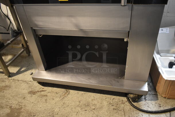 Fri-jado TDR 7-P Stainless Steel Commercial Electric Powered Rotisserie Oven w/ Under Shelf on Commercial Casters. 208 Volts, 3 Phase. - Image 5 of 6