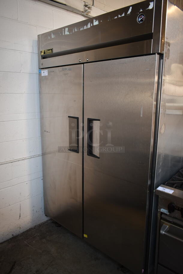 2012 True TG2R-2S ENERGY STAR Stainless Steel Commercial 2 Door Reach In Cooler w/ Poly Coated Racks on Commercial Casters. 115 Volts, 1 Phase. Tested and Working!