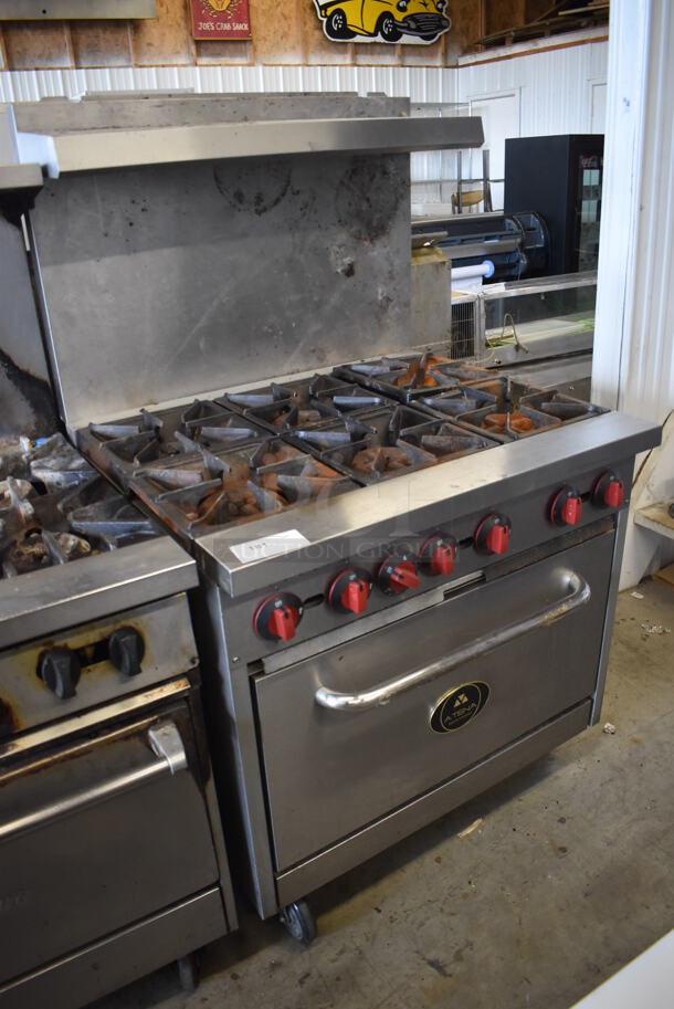 Atena Stainless Steel Commercial Natural Gas Powered 6 Burner Range w/ Oven, Over Shelf and Back Splash on Commercial Casters.  - Image 2 of 6