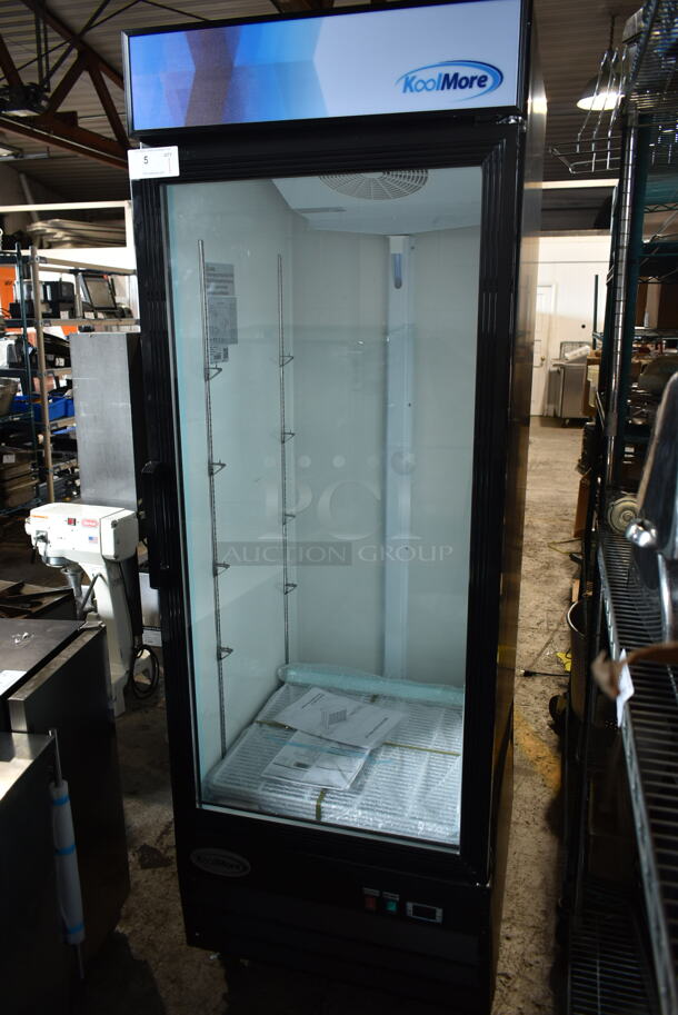 BRAND NEW SCRATCH AND DENT! 2023 KoolMore MDR-1GD-23C Metal Commercial Single Door Reach In Cooler Merchandiser w/ Poly Coated Racks on Commercial Casters. 115 Volts, 1 Phase. Tested and Working! - Image 1 of 7