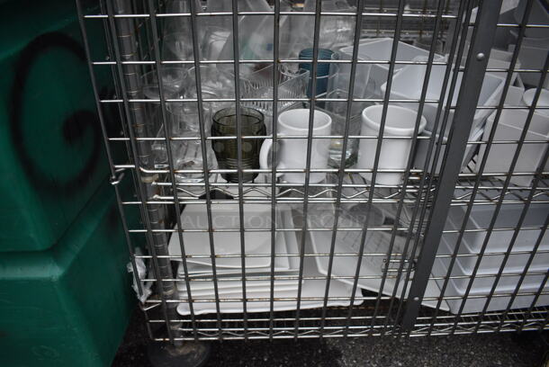 ALL ONE MONEY! Lot of Chrome Finish 5 Tier Shelving Unit on Commercial Casters w/ Liquor Cage and All Contents Including Glasses, White Ceramic Plates. BUYER MUST DISMANTLE. PCI CANNOT DISMANTLE FOR SHIPPING. PLEASE CONSIDER FREIGHT CHARGES. 38x25x68 - Image 9 of 10