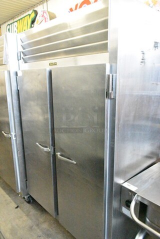 Traulsen AHT232NUT-FHS Stainless Steel Commercial 2 Door Reach In Cooler on Commercial Casters. 115 Volts, 1 Phase. Tested and Does Not Power On