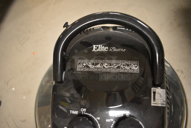 ALL ONE MONEY! Tier Lot of Various Items Including Panasonic Telephone, Audi Touch Up Set, Various Parts, and Elite Bistro Halogen Oven    - Image 7 of 8