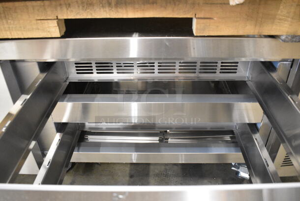 BRAND NEW SCRATCH AND DENT! 2023 Avantco 178CBE84HC Stainless Steel Commercial 4 Drawer Refrigerated Chef Base on Commercial Casters. 115 Volts, 1 Phase. Tested and Working! - Image 5 of 8