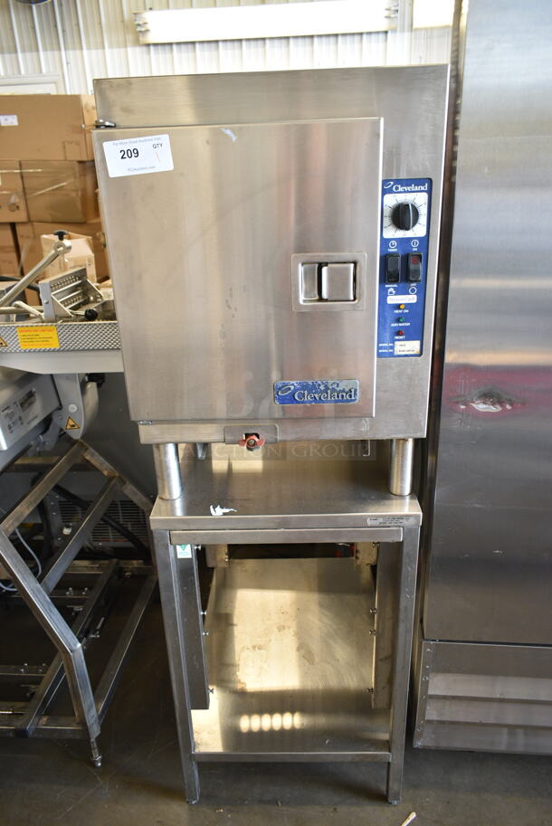 Cleveland 1SCE Stainless Steel Commercial Electric Powered Single Deck Steam Cabinet on ES21301 Stainless Steel Equipment Stand. 208 Volts, 3 Phase.  - Image 1 of 7
